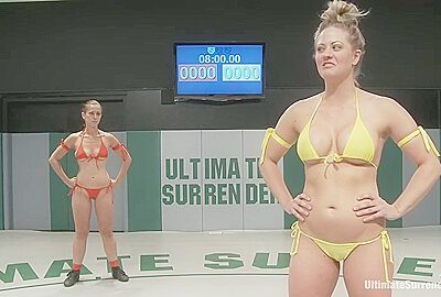 Blond Fitness Model & Gorgeous Brunette Battle It Out On The Mat. Loser Gets Fucked, Must Lick Pussy